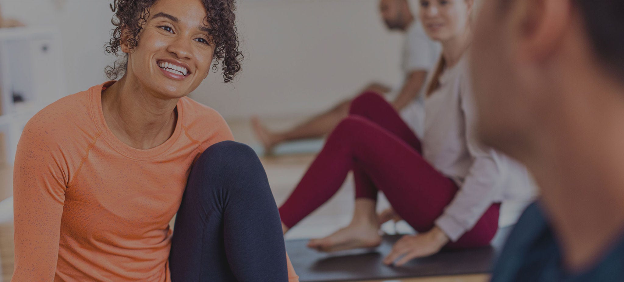Woman at her yoga class.